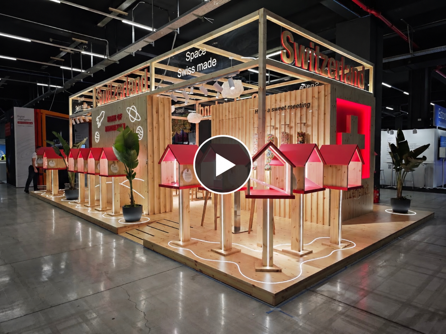 Reproducir vídeo del stand de Suiza